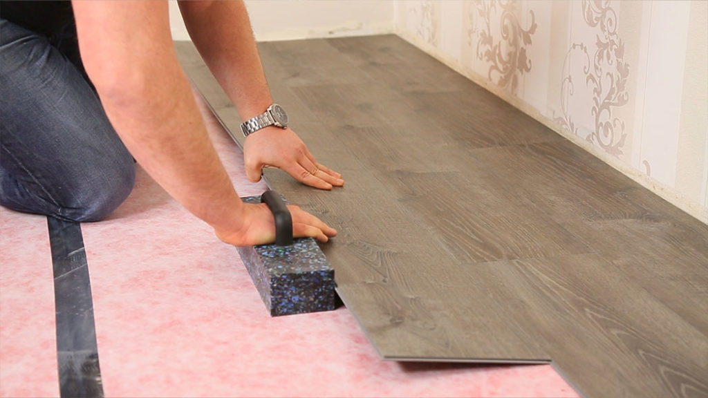 The tapping block is used to gently assemble the flooring elements.