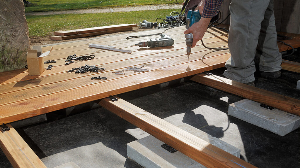 Building a Wooden Deck on Grass: Overcoming the Challenge with Ease